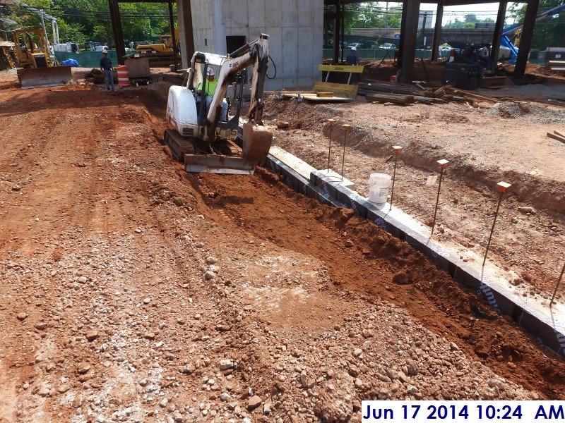 Backfilling and compacting along foundation wall at column line 6.5 (G-D) Facing South-East (800x600)